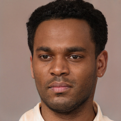 Neutral black young-adult male with short  black hair and brown eyes