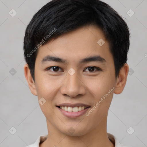 Joyful white young-adult male with short  black hair and brown eyes