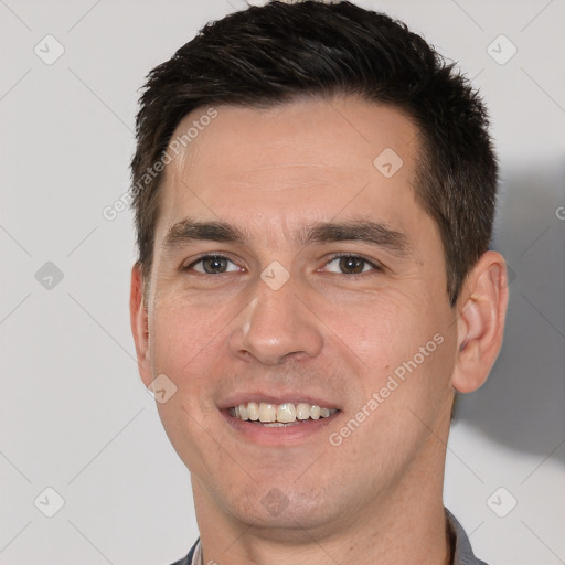 Joyful white young-adult male with short  brown hair and brown eyes