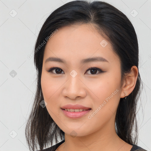 Joyful asian young-adult female with medium  brown hair and brown eyes