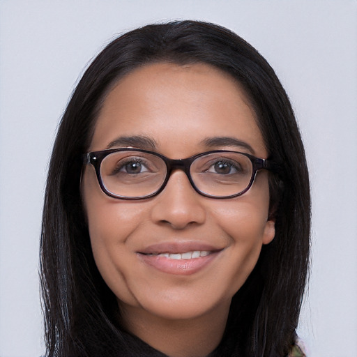 Joyful latino young-adult female with long  black hair and brown eyes