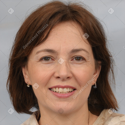 Joyful white adult female with medium  brown hair and brown eyes