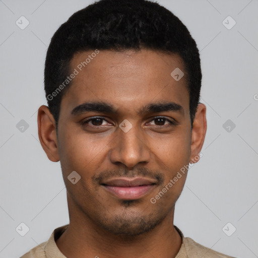 Joyful black young-adult male with short  black hair and brown eyes