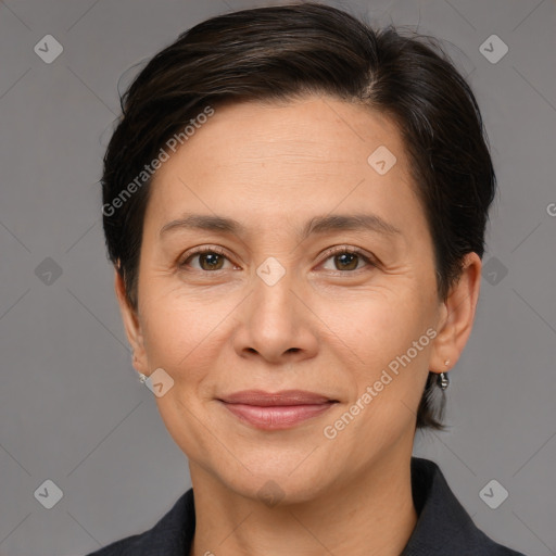 Joyful white adult female with medium  brown hair and brown eyes