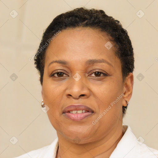 Joyful black adult female with short  brown hair and brown eyes