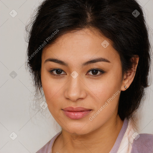 Joyful latino young-adult female with long  brown hair and brown eyes
