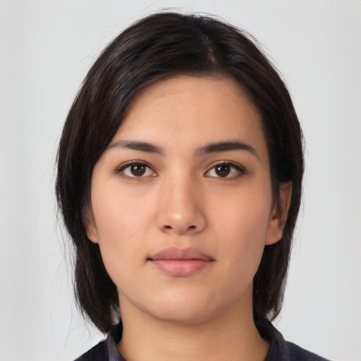Neutral white young-adult female with medium  black hair and brown eyes