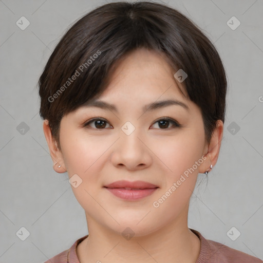 Joyful asian young-adult female with short  brown hair and brown eyes