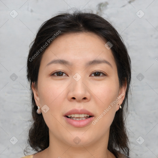 Joyful asian young-adult female with medium  brown hair and brown eyes