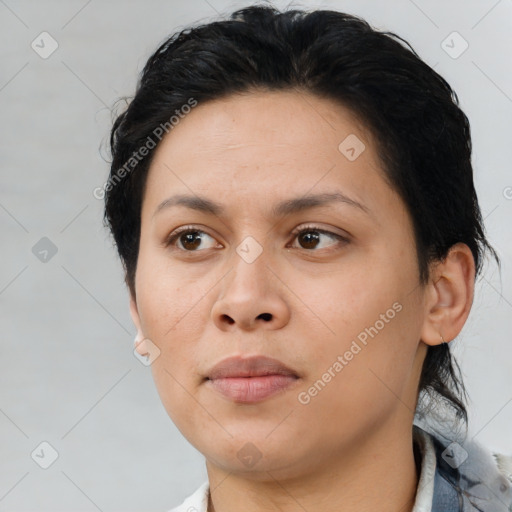 Neutral asian adult female with medium  brown hair and brown eyes