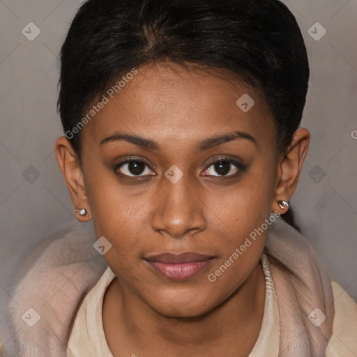 Joyful black young-adult female with short  brown hair and brown eyes