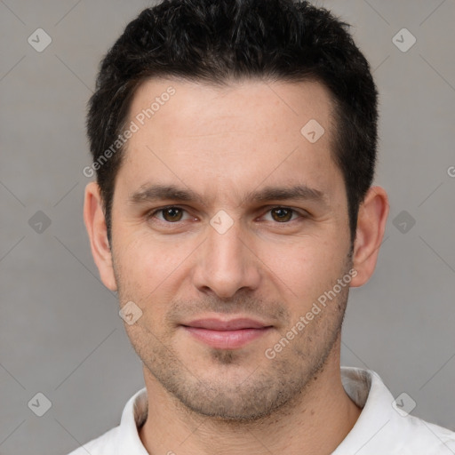 Joyful white young-adult male with short  black hair and brown eyes