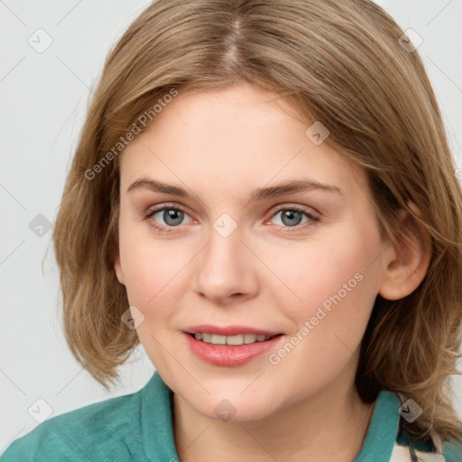 Joyful white young-adult female with medium  brown hair and blue eyes