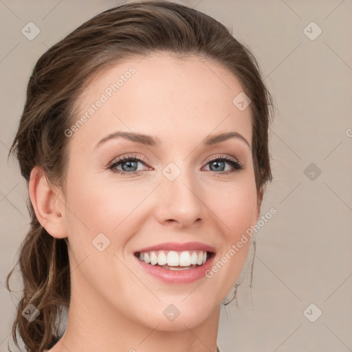 Joyful white young-adult female with medium  brown hair and green eyes