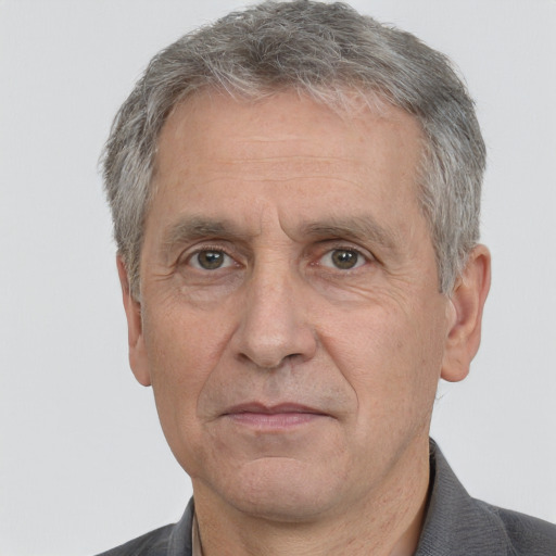 Neutral white middle-aged male with short  gray hair and brown eyes