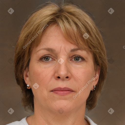 Joyful white adult female with medium  brown hair and grey eyes