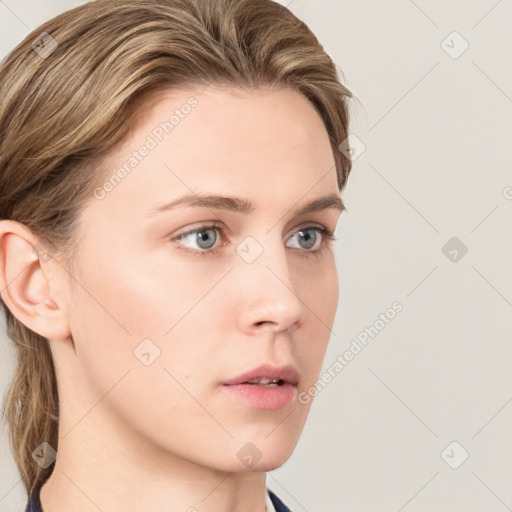 Neutral white young-adult female with medium  brown hair and grey eyes