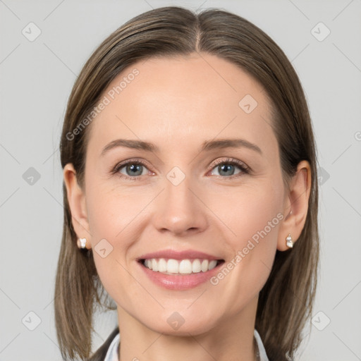 Joyful white young-adult female with medium  brown hair and grey eyes