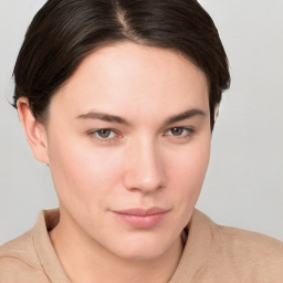 Neutral white young-adult female with short  brown hair and brown eyes