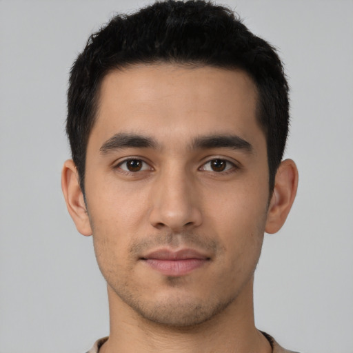 Neutral latino young-adult male with short  brown hair and brown eyes