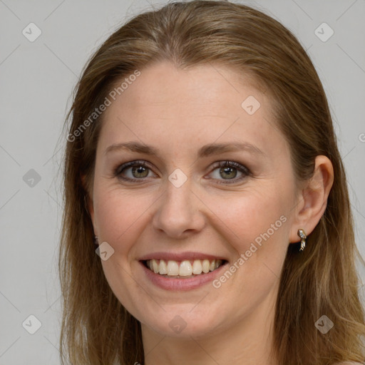 Joyful white young-adult female with long  brown hair and grey eyes