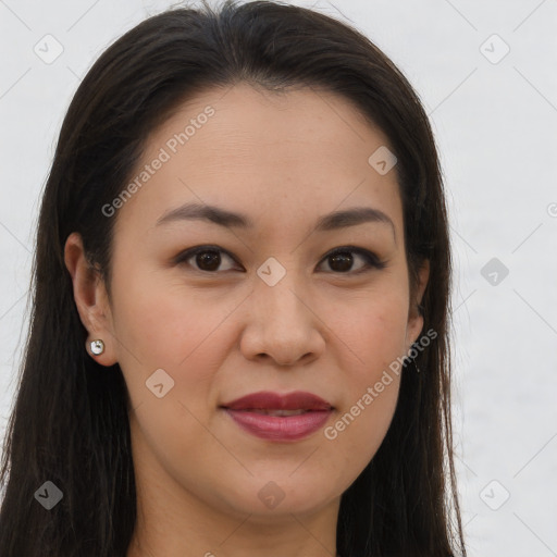 Joyful asian young-adult female with long  brown hair and brown eyes