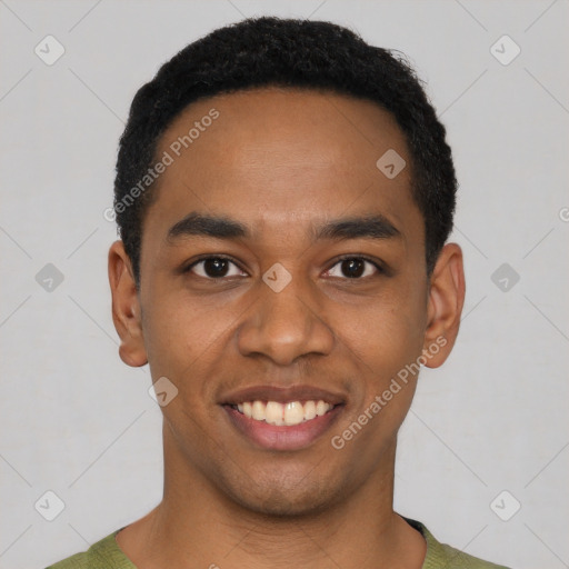 Joyful black young-adult male with short  black hair and brown eyes