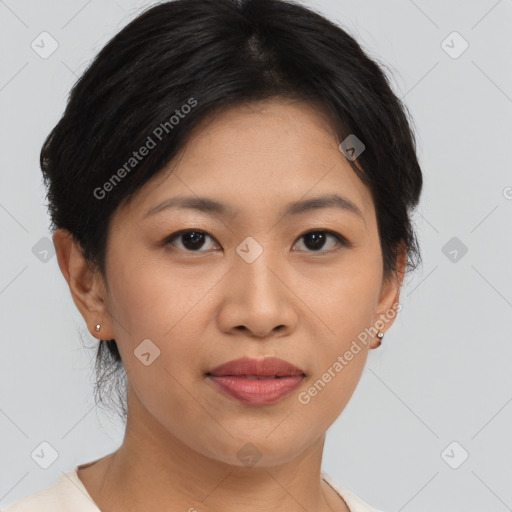 Joyful asian young-adult female with short  brown hair and brown eyes