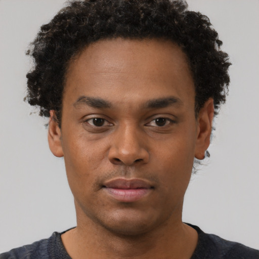 Neutral black young-adult male with short  brown hair and brown eyes