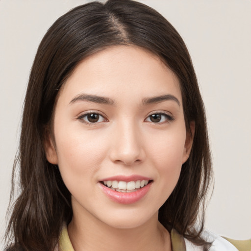 Joyful white young-adult female with medium  brown hair and brown eyes