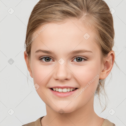 Joyful white child female with medium  brown hair and grey eyes