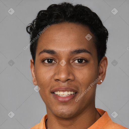 Joyful black young-adult male with short  black hair and brown eyes