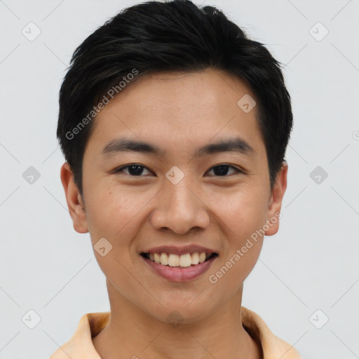 Joyful asian young-adult male with short  brown hair and brown eyes