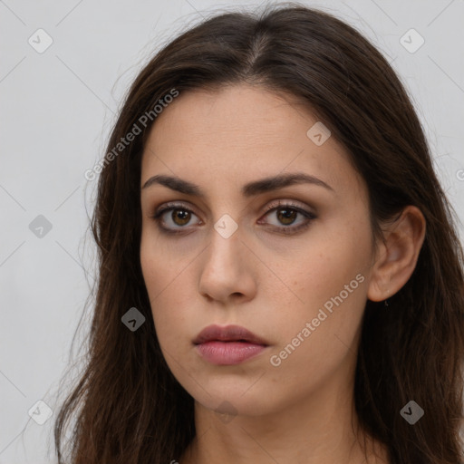 Neutral white young-adult female with long  brown hair and brown eyes