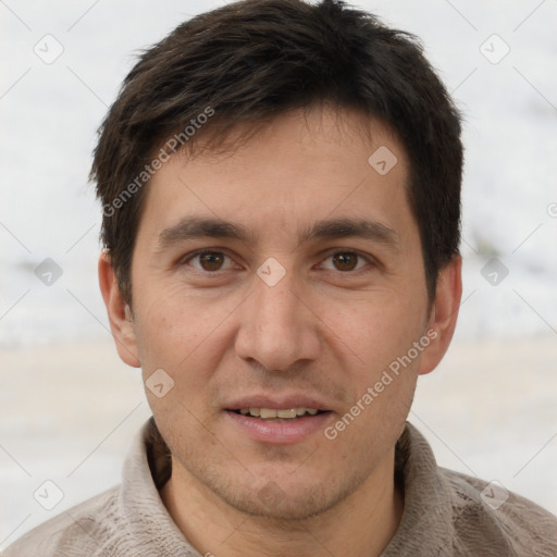 Joyful white adult male with short  brown hair and brown eyes