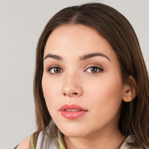 Neutral white young-adult female with medium  brown hair and green eyes