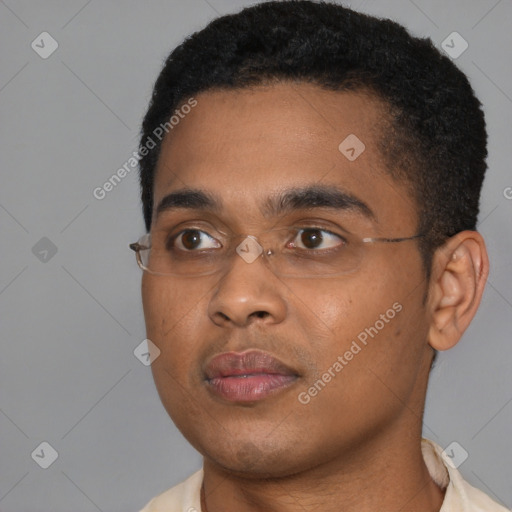 Neutral black young-adult male with short  brown hair and brown eyes