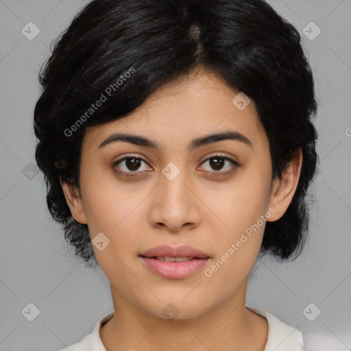 Joyful asian young-adult female with medium  black hair and brown eyes