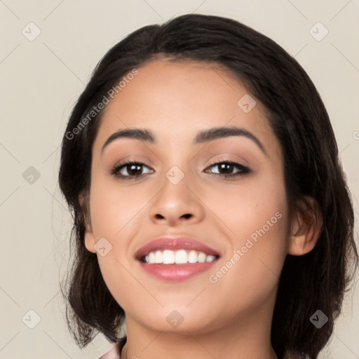 Joyful asian young-adult female with medium  black hair and brown eyes