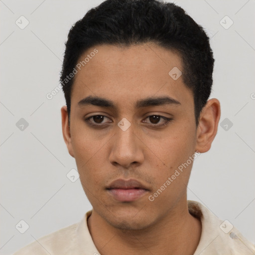 Neutral latino young-adult male with short  black hair and brown eyes