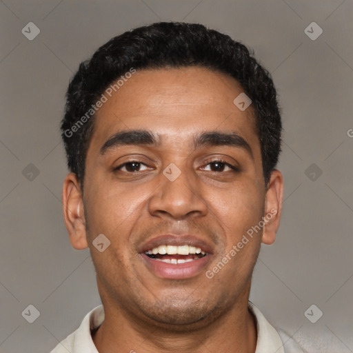 Joyful black young-adult male with short  black hair and brown eyes