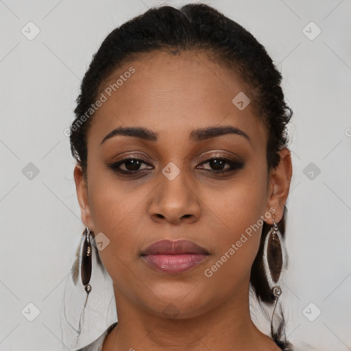 Joyful black young-adult female with short  brown hair and brown eyes