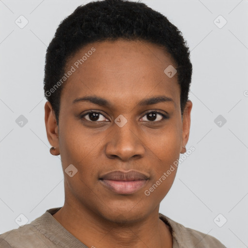 Joyful black young-adult female with short  black hair and brown eyes