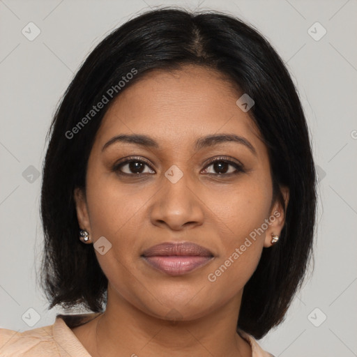 Joyful black young-adult female with medium  brown hair and brown eyes