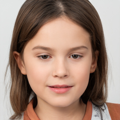 Joyful white child female with medium  brown hair and brown eyes