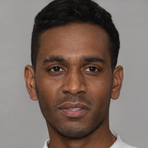 Neutral latino young-adult male with short  brown hair and brown eyes