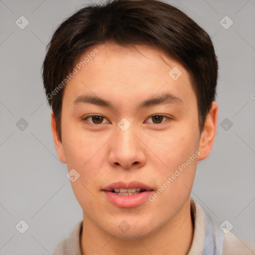 Joyful asian young-adult male with short  brown hair and brown eyes