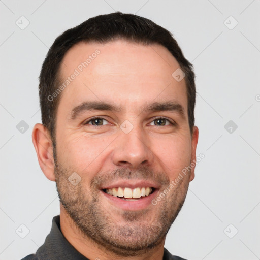 Joyful white young-adult male with short  brown hair and brown eyes