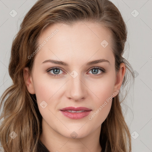 Joyful white young-adult female with long  brown hair and blue eyes