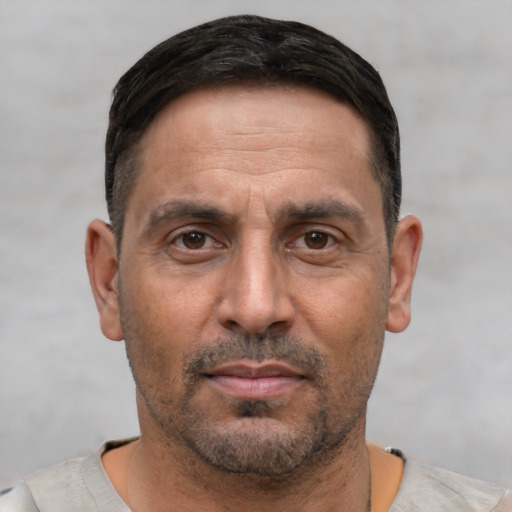 Neutral white adult male with short  brown hair and brown eyes